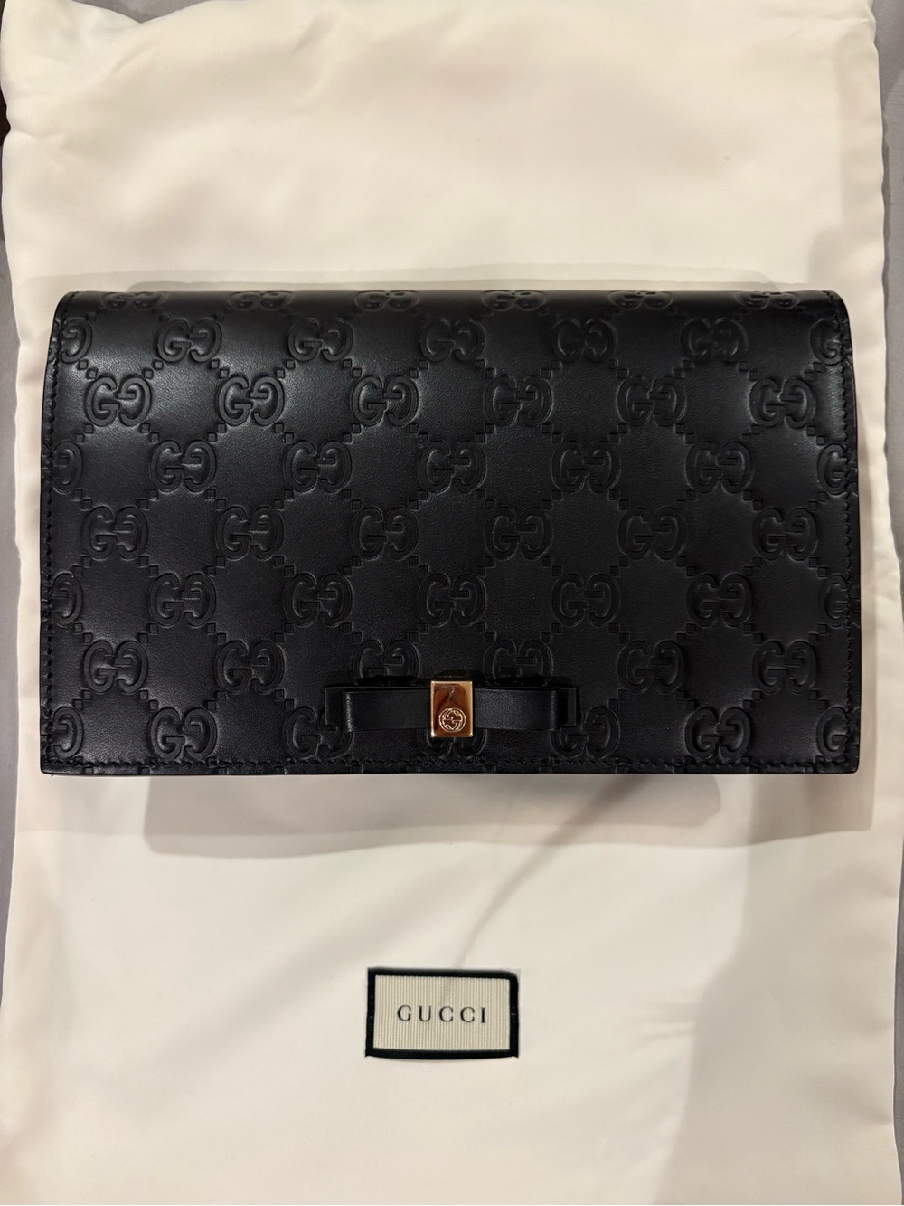 Gucci Black GG Embossed Leather Wallet on chain with removable chain, crossbody